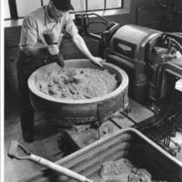 Frank Gannon creating a mold for sand casting